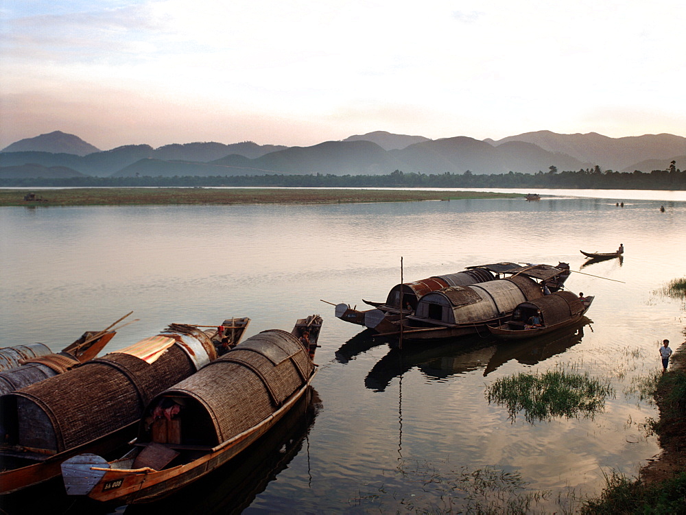 Local boats along the banks of Hue's Perfume River, Hue, Vietnam, Indochina, Southeast Asia, Asia