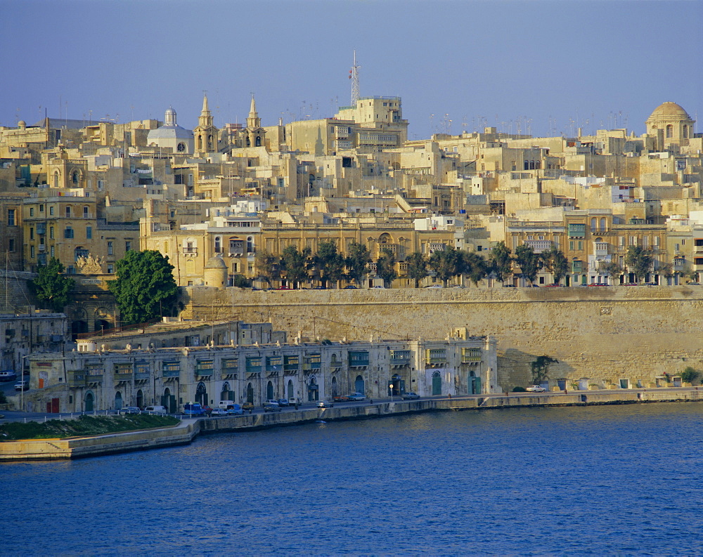 St. Barbara Bastion and Barbierra Wharf, with St. Lucia church and Valletta (Valetta) behind, Malta, Europe