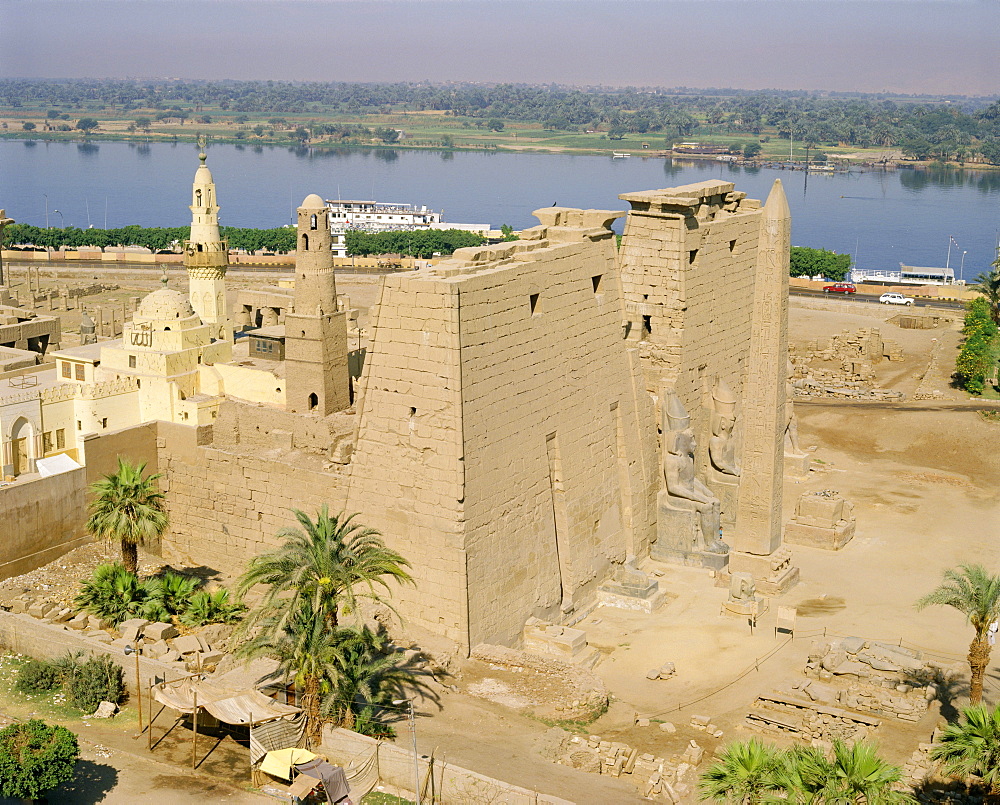 Aerial view over the Temple of Luxor and the Abu el-Haggag Mosque, an Islamic building inside an ancient Egyptian temple beside the River Nile, Luxor, Thebes, Egypt, North Africa, Africa