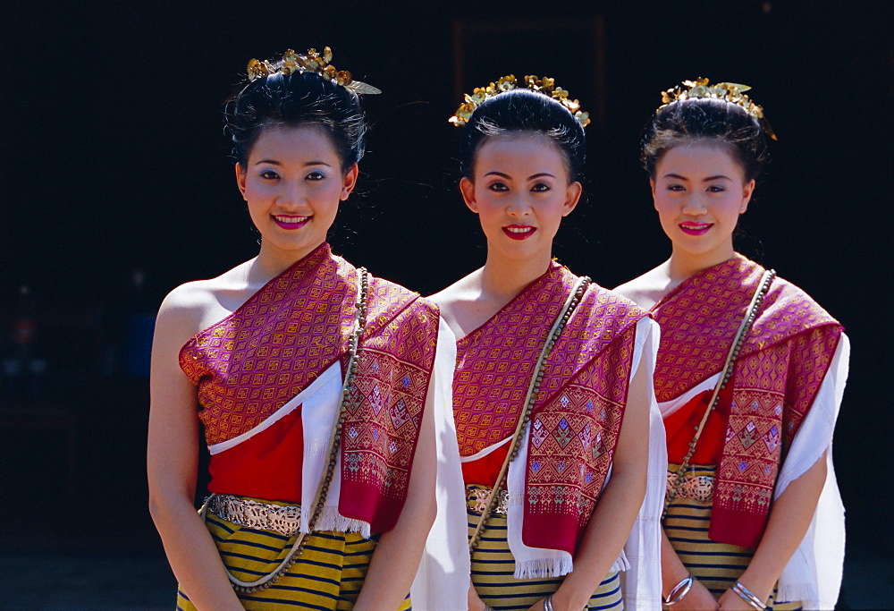 Portrait of three traditional Thai dancers, Chiang Mai, northern Thailand, Asia