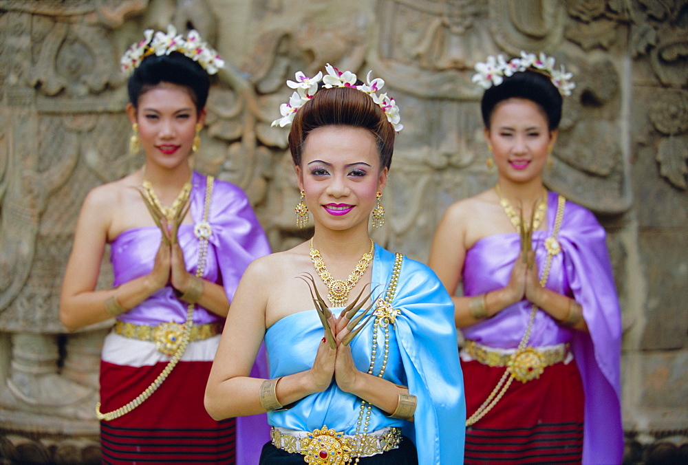 Portrait of three traditional Thai dancers, Chiang Mai, northern Thailand, Asia