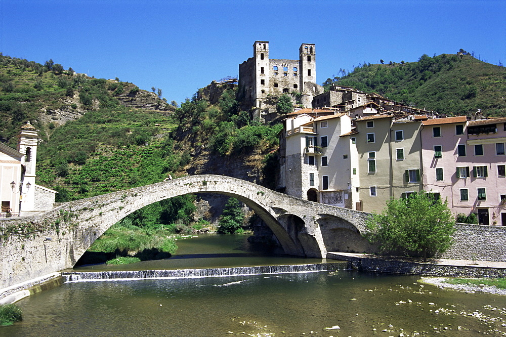 The 15th century Doria's castle and medieval bridge across the River Nervia, Dolceacqua, Italian Riviera, Liguria, Italy, Europe