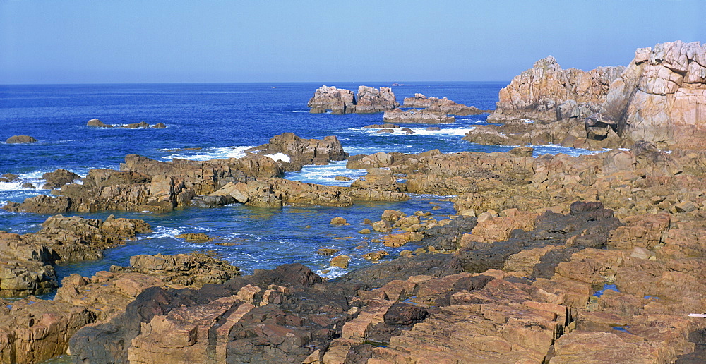 Rocks on the coast at Pointe du Chateau, Le Gouffre, on the Cote de Granit Rose in the Cotes d'Amor, Brittany, France, Europe