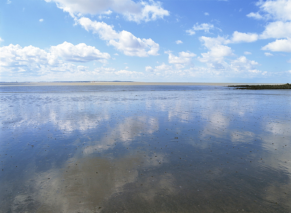 Reflections of blue sky and white clouds in the Conche de Foncillon, at Royan, in Charente-Maritime, in Poitou Charentes, France, Europe