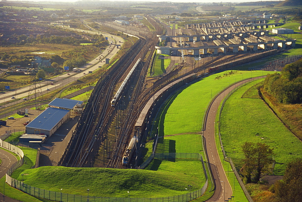 Shuttle entering and Eurostar leaving the Channel Tunnel, seen from Castle Hill, Folkestone, Kent, England, United Kingdom, Europe