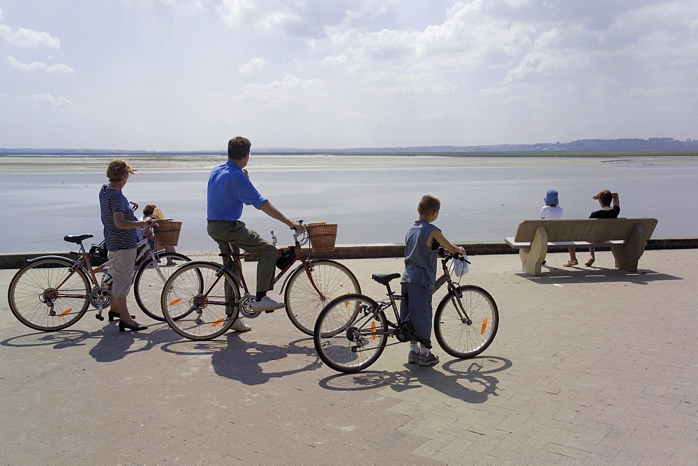 Family on bicycles, Le Crotoy, Somme Estuary, Picardy, France, Europe