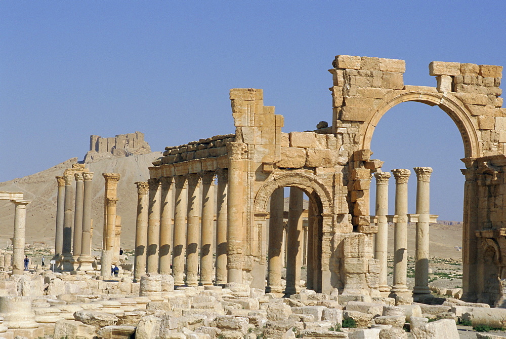 Triumphal Arch, colonaded street of Roman city, Palmyra, Syria, Middle East