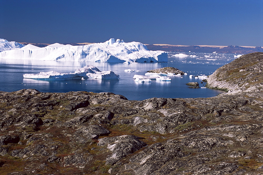 Icebergs from the Kangia Ice Fiord seen from hills above Sermermiut, Ilulissat (Jacobshavn), west coast, Greenland, Polar Regions