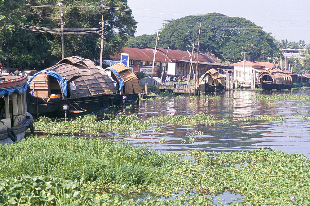 Rice boats on the backwaters, Kerala, India, Asia