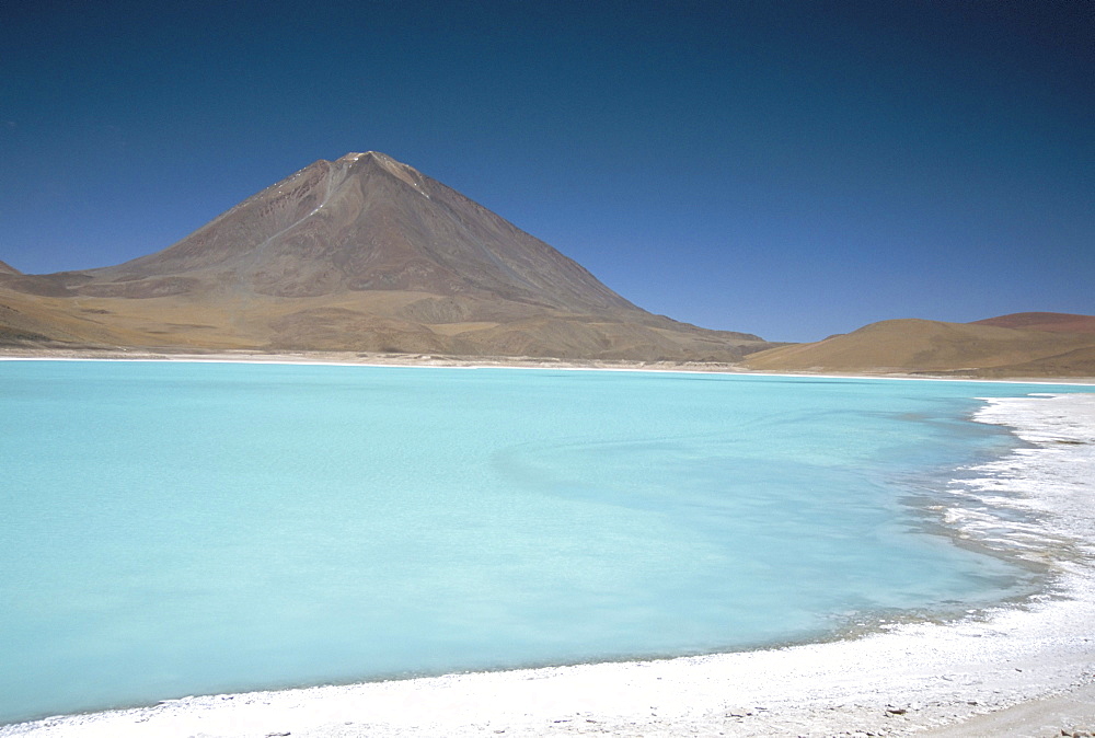 Laguna Verde with mineral flat margin and Volcan Licancabur, 5960m, Southwest Highlands, Bolivia, South America