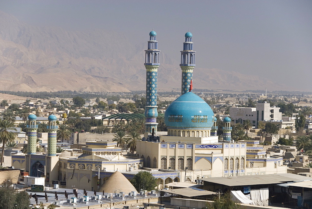 Minarets and dome of main mosque centre of desert town, Lar city, Fars province, southern Iran, Middle East