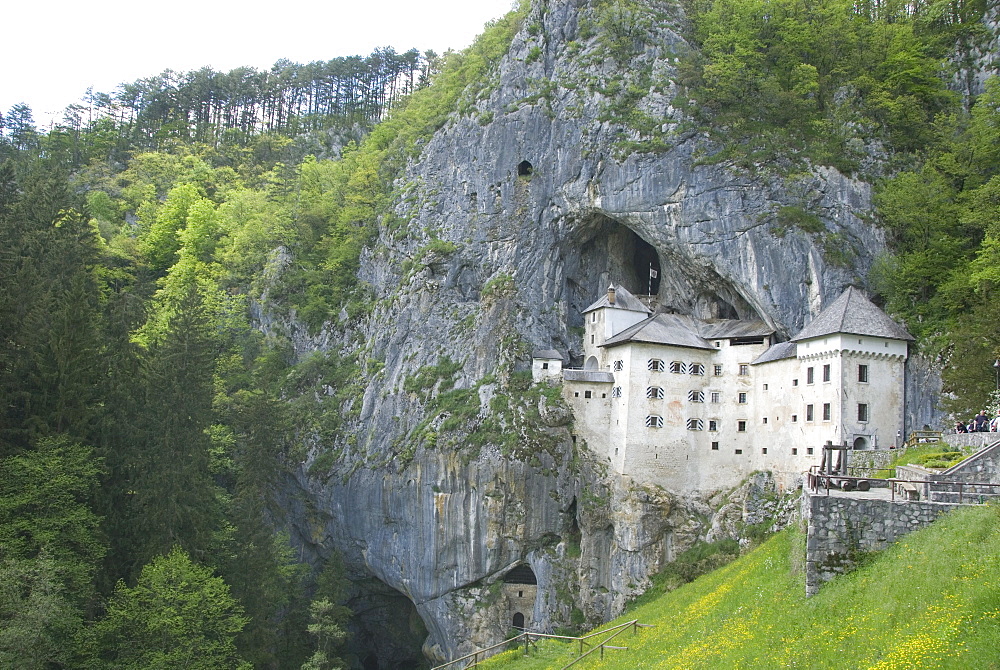 Predjama Castle, built in mouth of cave, near Postojna, Slovenia, Europe