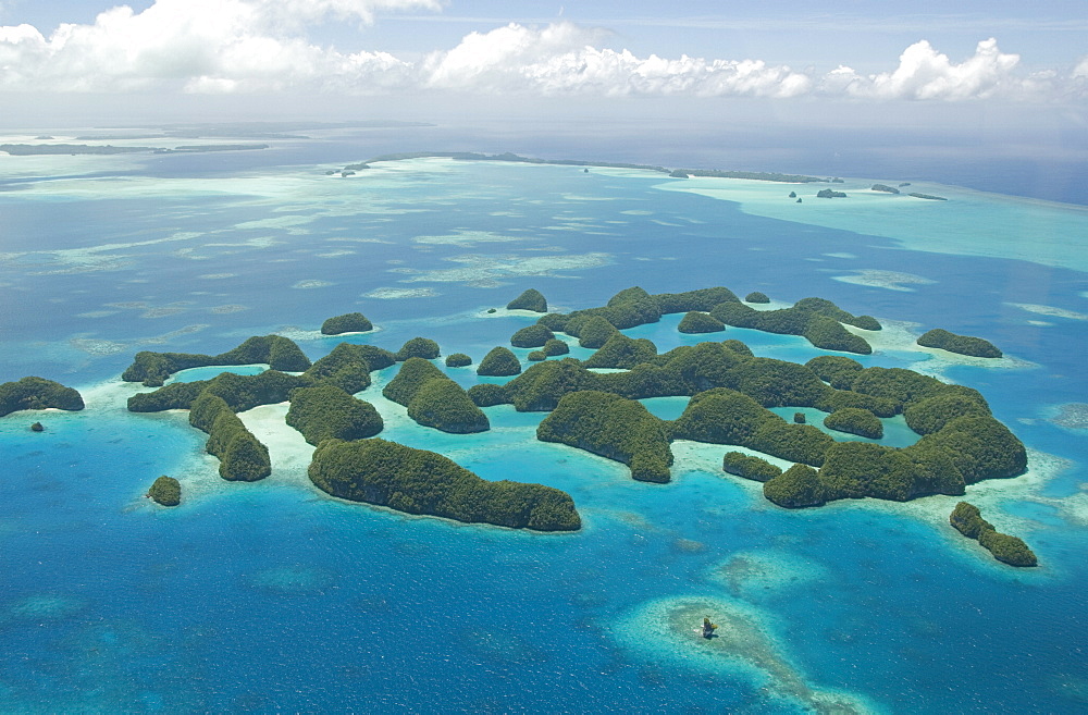 Seventy Islands (Ngerukewid Islands Wildlife Preserve), forest-covered limestone rock, protected as a Nature Reserve, so can only be seen from the air, Palau, Micronesia, Western Pacific Ocean, Pacific