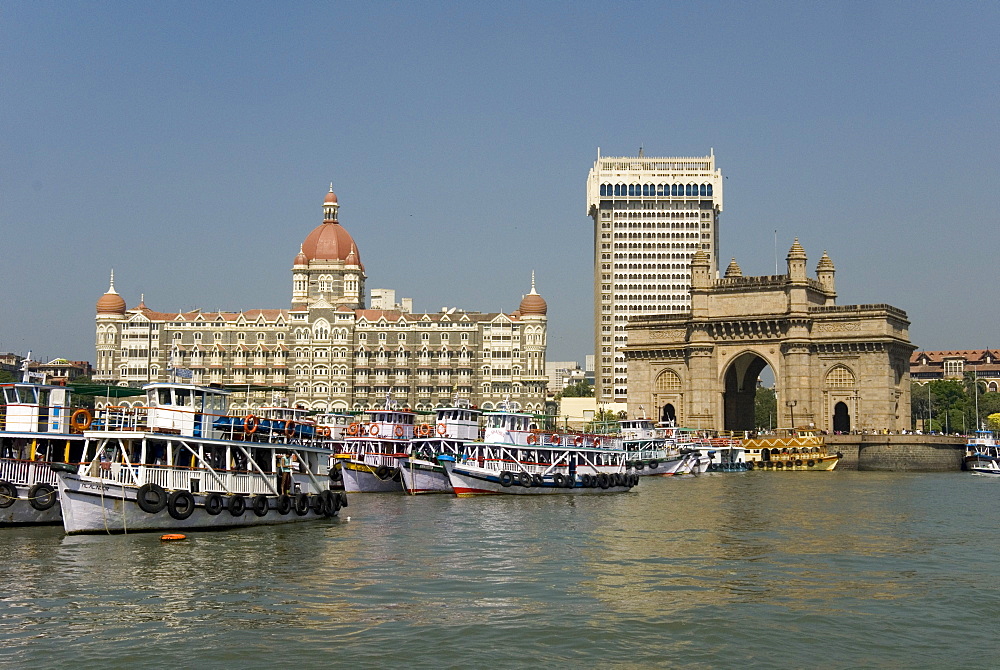 Gateway of India on the dockside beside the Taj Mahal Hotel, Mumbai, India, Asia 