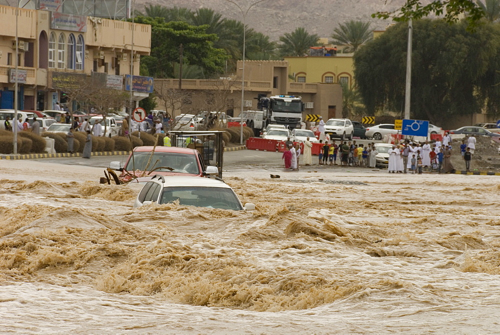 A flash flood in the wadi through the centre of town, Nizwa, Oman, Middle East 