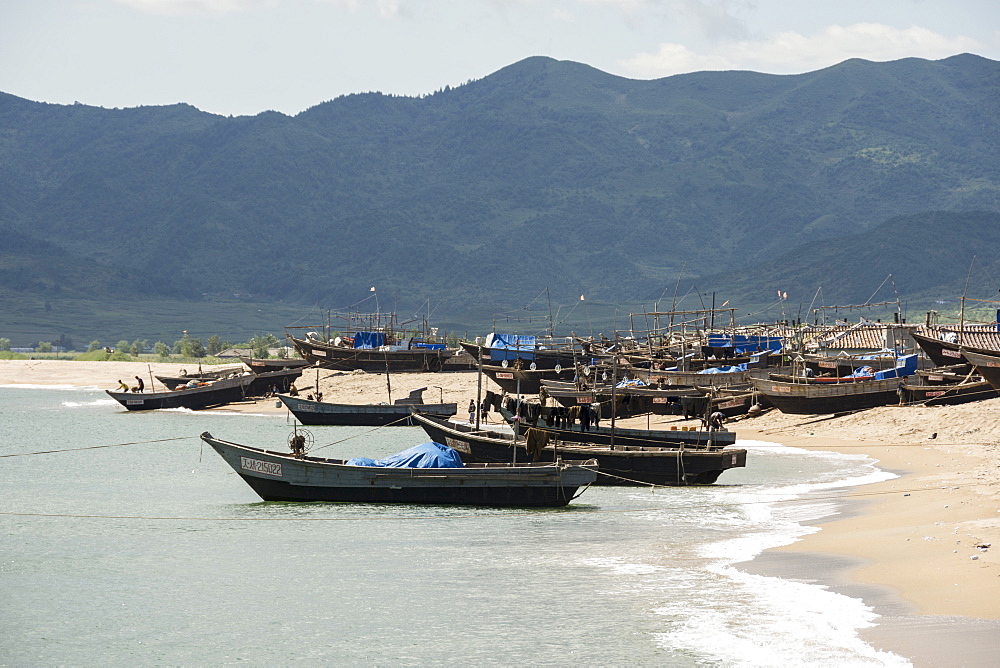 Fishing boats on beach at Yongbun, near Chongjin, Hamgyong Province, North Korea, Asia