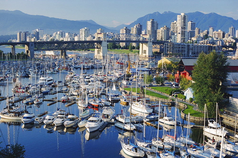 City centre seen across marina in Granville Basin, Vancouver, British Columbia, Canada