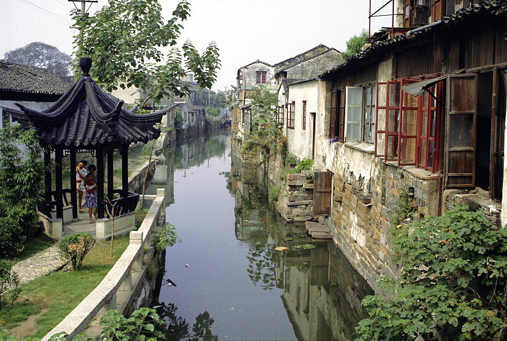 Venice of the East', one of the many canals still in use, lined with typical houses, Suzhou, eastern China, Asia