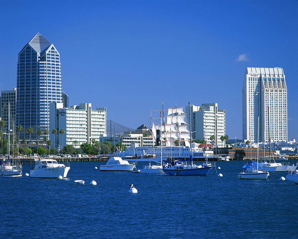 Boats in the harbour and city skyline of San Diego, California, United States of America, North America