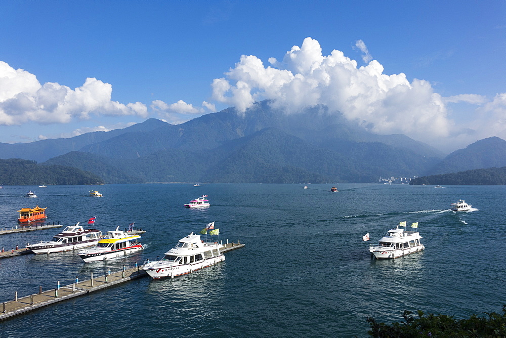 travel destination, photography, horizontal, colour image, horizontal, outdoors, day, cloudy sky, lake, shuishe pier, sun moon lake, taiwan, asia, pier, mountain, blue, elevated view, incidental people, transportation, yacht, taiwanese culture