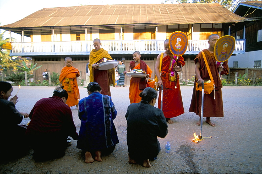 Buddhist monks collecting alms, Maung Sing, Laos, Indochina, Southeast Asia, Asia