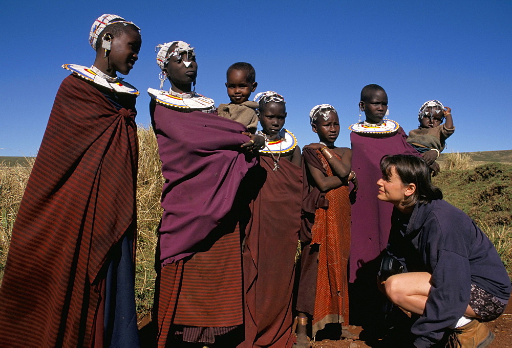 Tourist with Masai people, Ngorongoro Crater, Tanzania, East Africa, Africa