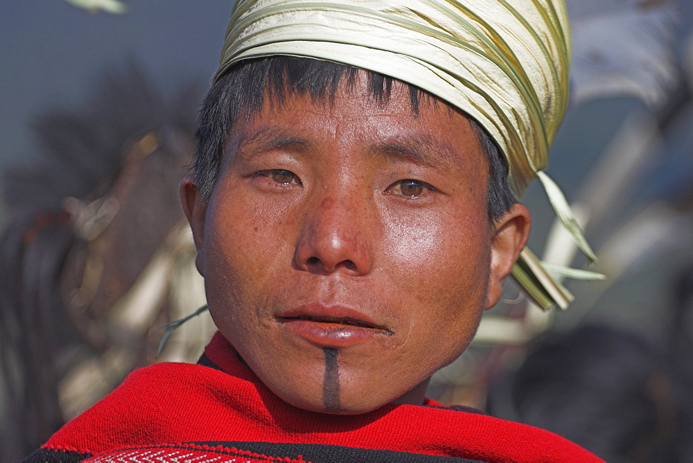 Naga man wearing traditional hand-woven blanket, Naga New Year Festival, Lahe village, Sagaing Division  Myanmar (Burma), Asia