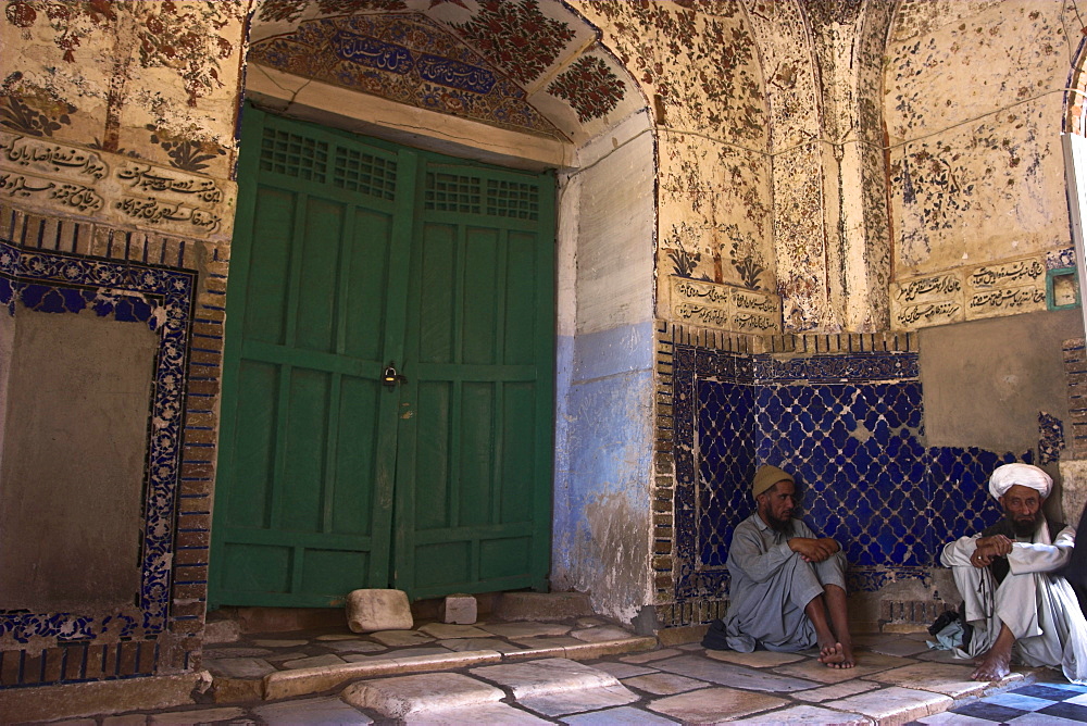 Pilgrims in the hallway, Sufi shrine of Gazargah, Herat, Herat Province, Afghanistan, Asia