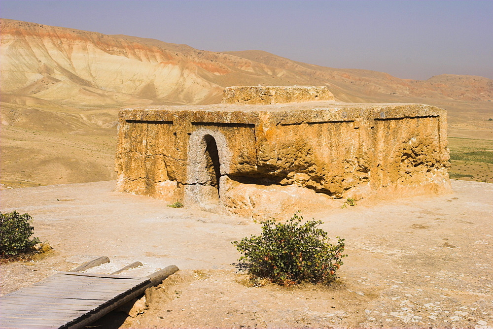 Buddhist stupa carved out of rock at Takht-I-Rustam (Rustam's throne) an early burial mound that contained relics of the Buddha, part of a stupa-monastery complex dating from the Kushano-Sasanian period 4th-5th century AD, near Haibak,Samangan Province, Afghanistan, Asia