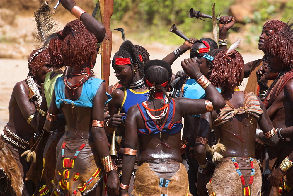 Women sing and dance before the bull jumping, Hamer Jumping of the Bulls initiation ceremony, Turmi, Lower Omo valley, Ethiopia, Africa