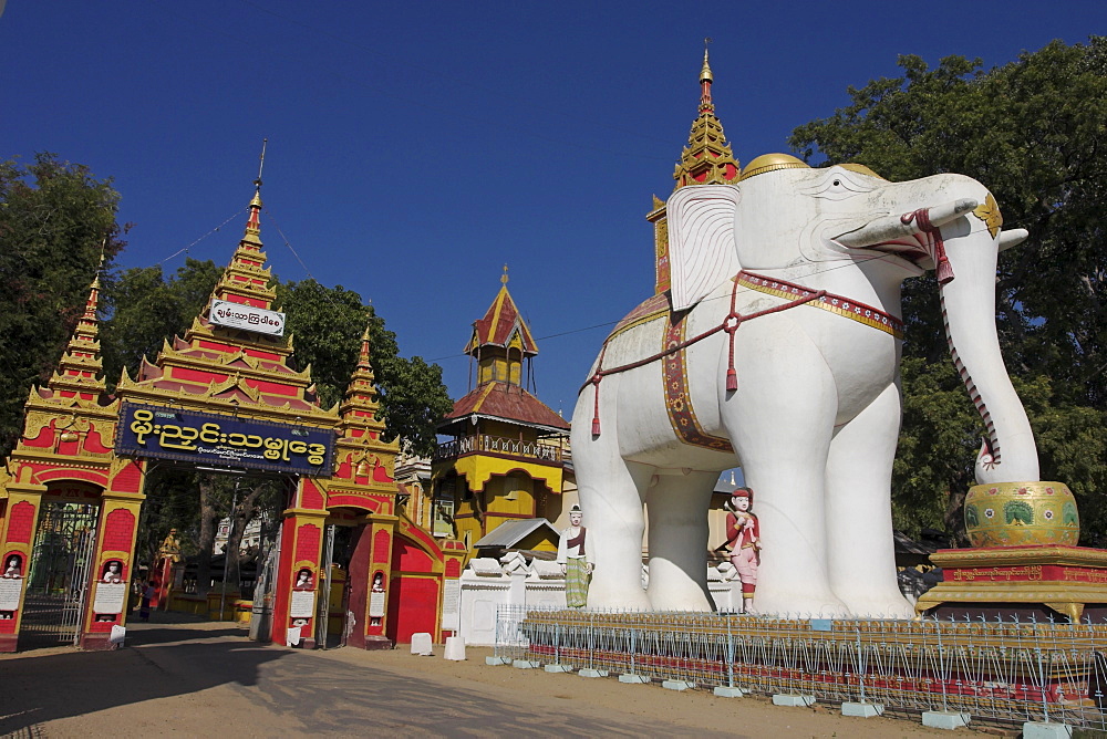 White elephant guards entrance to Thanboddhay Paya built in the 20th century by Moehnyin Sayadaw, said to contain over 500000 Buddha images, Monywa, Sagaing Division, Myanmar (Burma), Asia