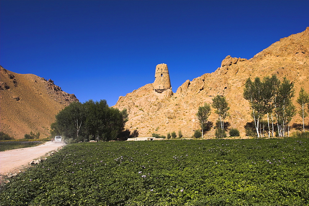 Watchtower at ruins which were once the site of a tall standing Buddha in a niche, Kakrak valley, Bamiyan, Afghanistan, Asia