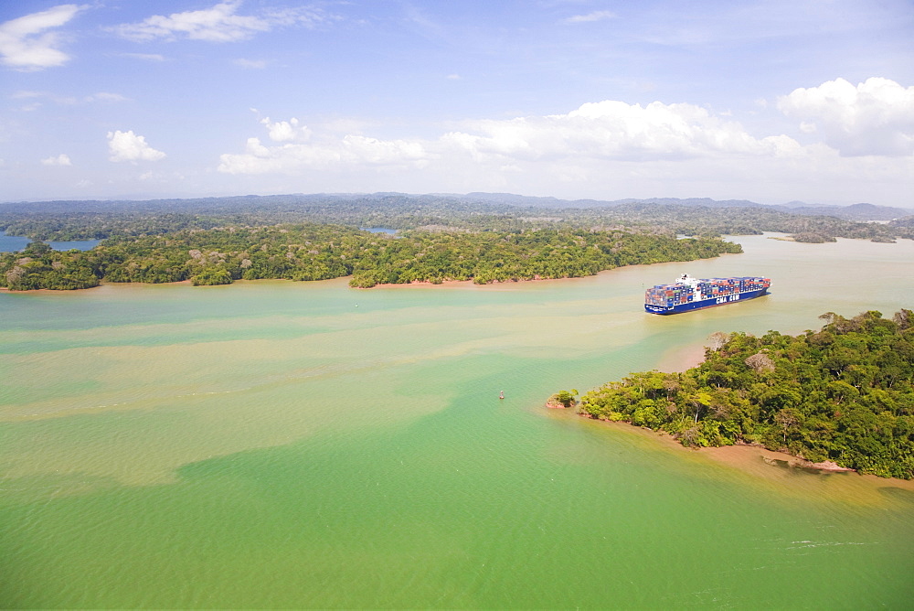 Container ship transiting Panama Canal, Gatun Lake, Panama, Central America