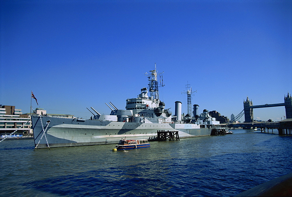 HMS Belfast moored near Tower Bridge on the Thames, London, England, United Kingdom, Europe