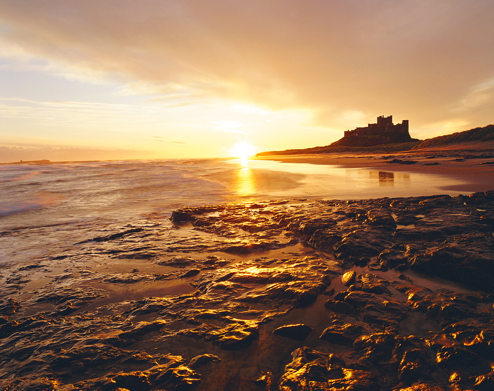 Bamburgh Castle at sunrise, Northumberland, England