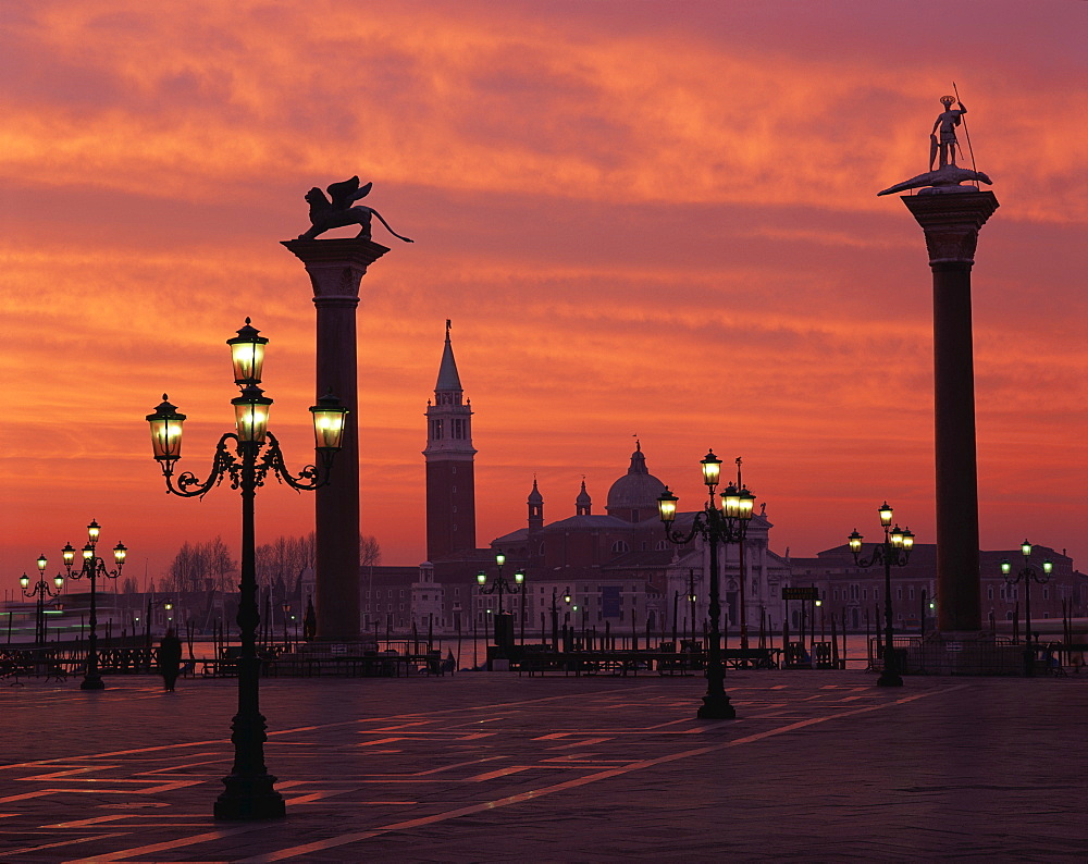 View across St. Marks Square towards San Giorgio Maggiore at sunrise, Venice, UNESCO World Heritage Site, Veneto, Italy, Europe