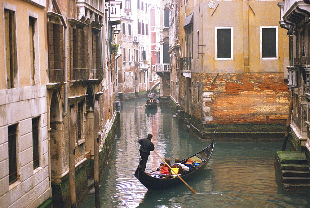 Gondolas on canal near S.Maria Formosa, Venice, Italy 