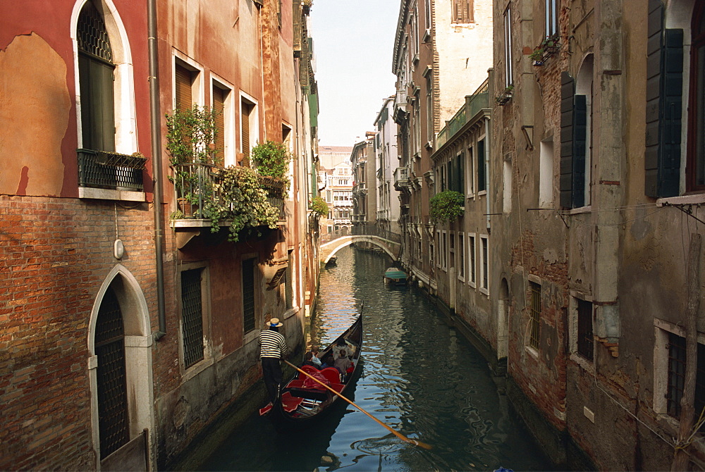 Gondolas on a canal near Piazza San Maria Formosa. Venice, Veneto, Italy, Europe