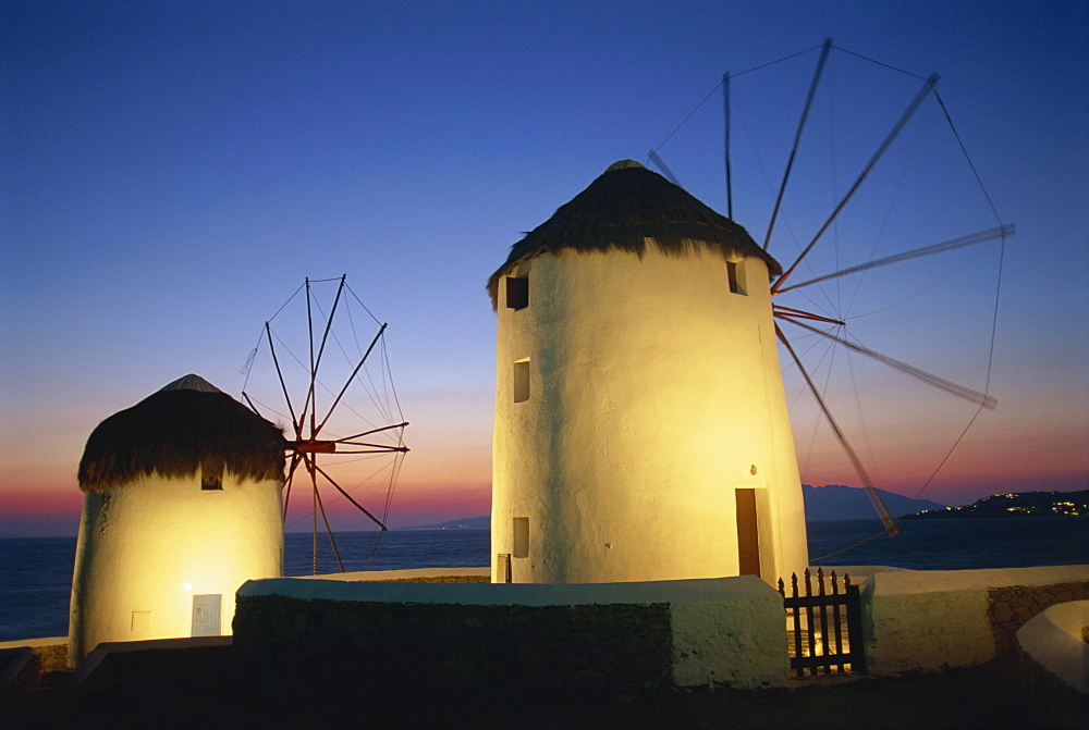 Floodlit windmills at night, Mykonos Town, Mykonos, Cyclades, Greek Islands, Greece, Europe