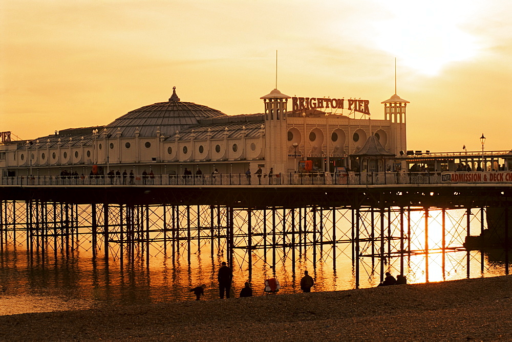 Brighton Pier at sunset, Brighton, East Sussex, England, United Kingdom, Europe