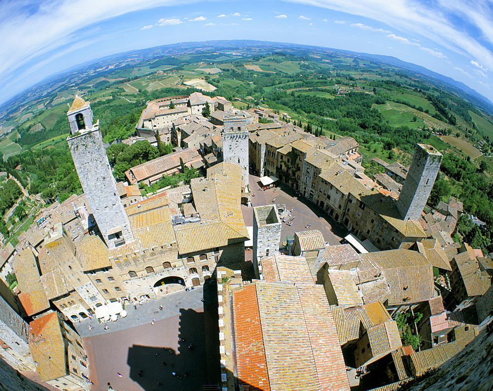 Looking down on San Gimignano from one of the town's medieval stone towers, San Gimignano, UNESCO World Heritage Site, Tuscany, Italy, Europe