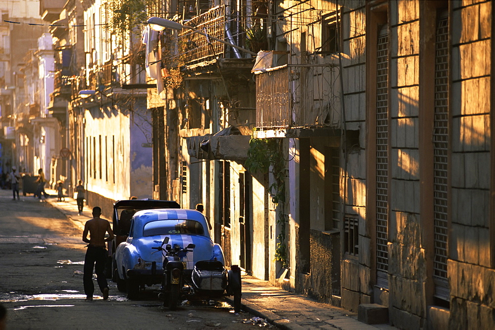 Street scene in evening light, Havana, Cuba, West Indies, Central America