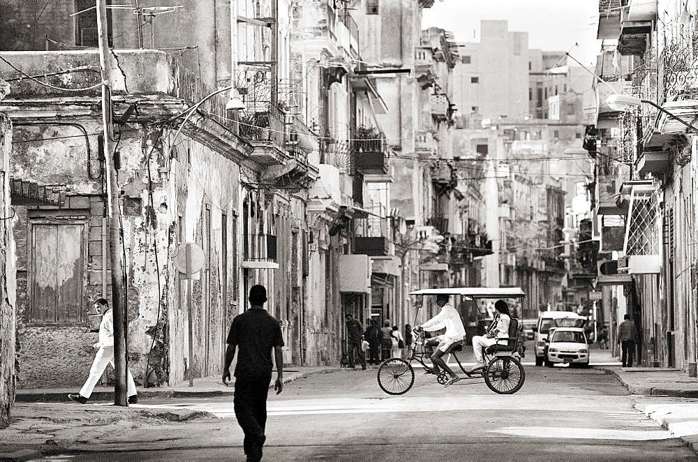 Image taken with a Holga medium format 120 film toy camera of view along busy street, Havana, Cuba, West Indies, Central America