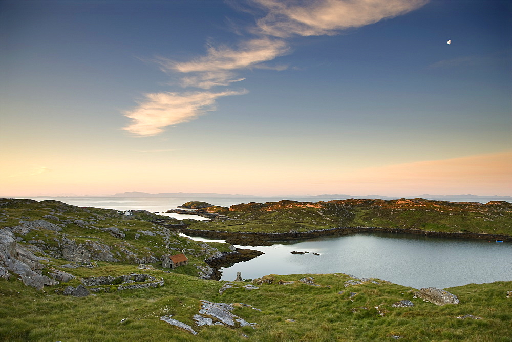 Dawn view towards the township of Manish and the coastline of Harris, Isle of Skye on the horizon, Outer Hebrides, Scotland, United Kingdom, Europe