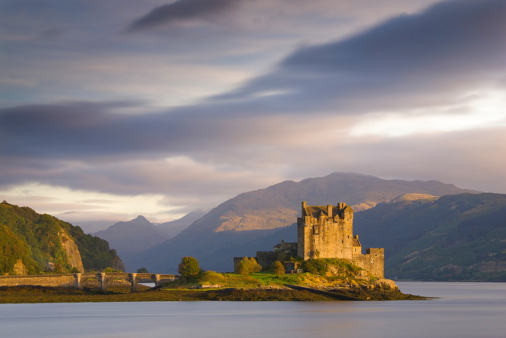 Eilean Donan Castle bathed in evening light, Loch Duich, near Kyle of Lochalsh, Highland, Scotland, United Kingdom, Europe