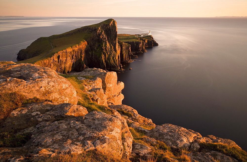 Neist Point and Lighthouse bathed in evening light, Isle of Skye, Highland, Scotland, United Kingdom, Europe