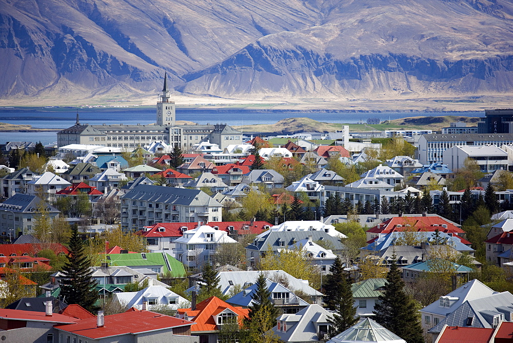 View over Reykjavik with mountains looming in the distance, Reykjavik, Iceland, Polar Regions