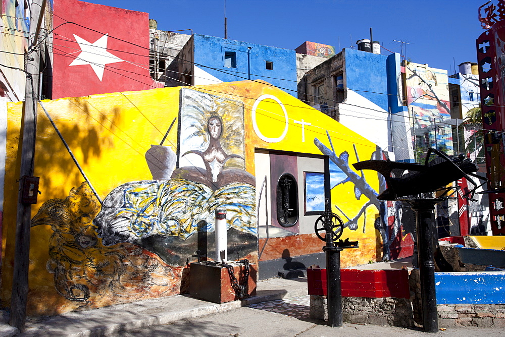 Buildings painted in colourful Afro-Cuban art, masterminded by artist Salvador Gonzalez Escalona, Callejon de Hamel, Havana, Cuba, West Indies, Central America