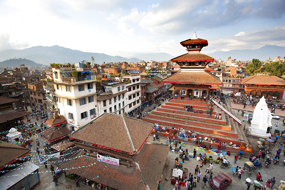 View over Durbar Square from rooftop cafe showing temples and busy streets, Kathmandu, Nepal, Asia