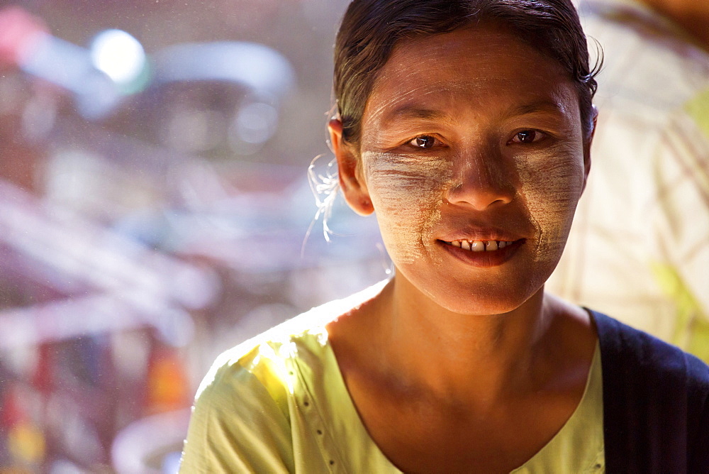 Local woman with Thanakha traditional face painting, Thiri Mingalar Market, Yangon (Rangoon), Myanmar (Burma), Asia